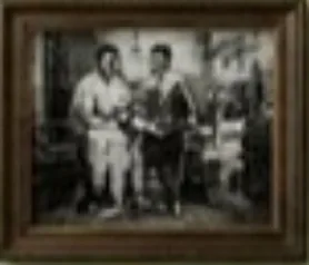 Due barbieri in una vecchia foto in bianco e nero